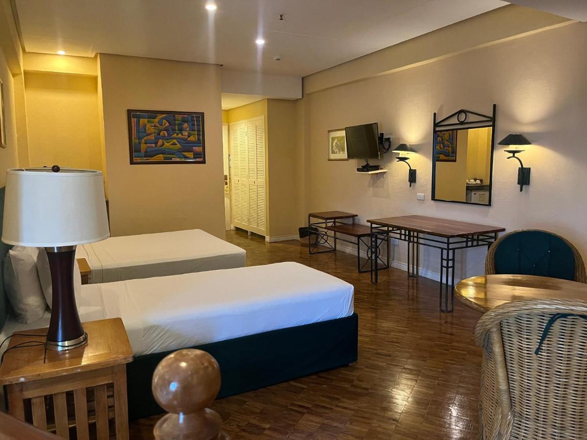 Coco Grande Hotel Dumaguete City Bagian luar foto