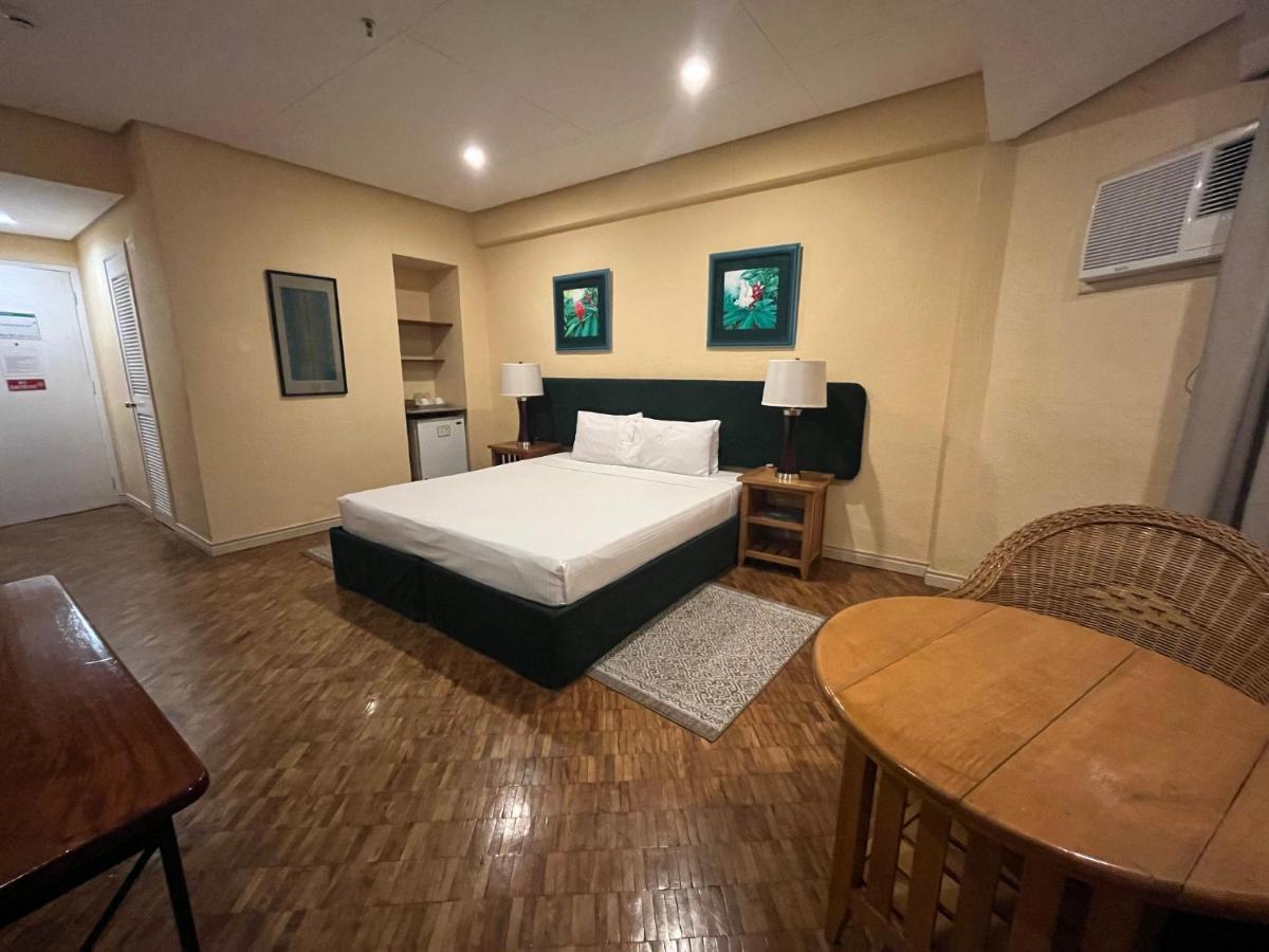 Coco Grande Hotel Dumaguete City Bagian luar foto